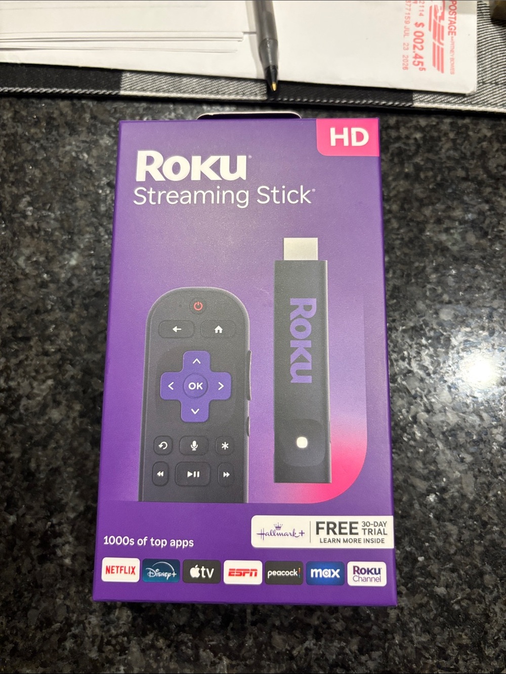 Roku Streaming Stick with Purple Packaging and Remote